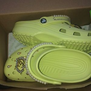 Lime green crocs.